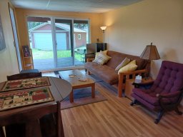 Living room with Futon and sliding glass doors